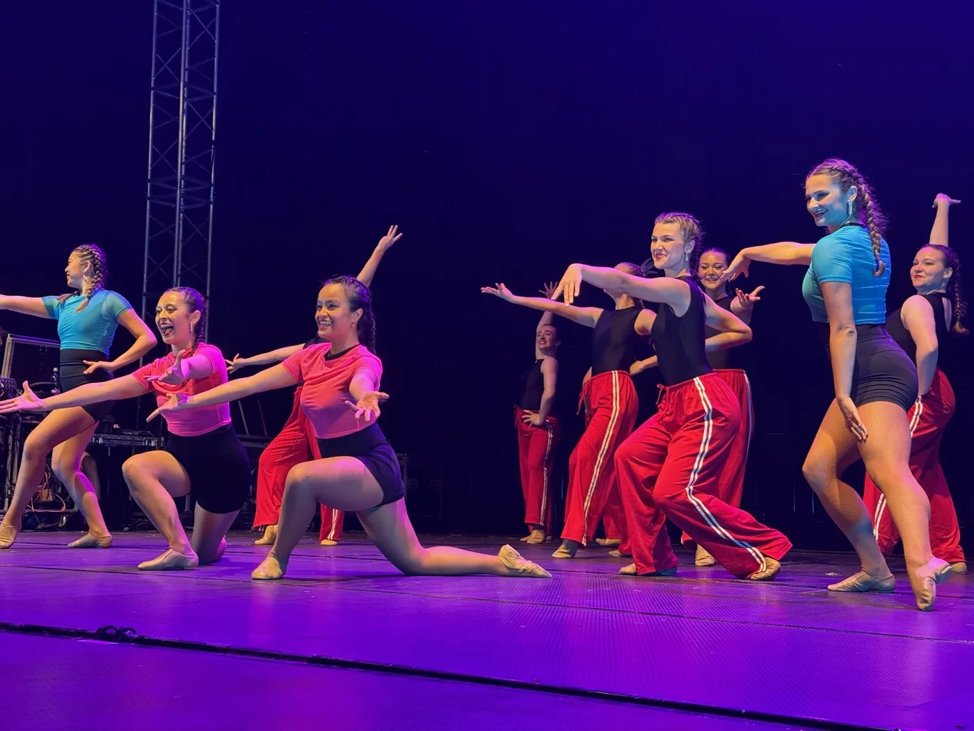 Dancers performing on stage at an end of year performance
